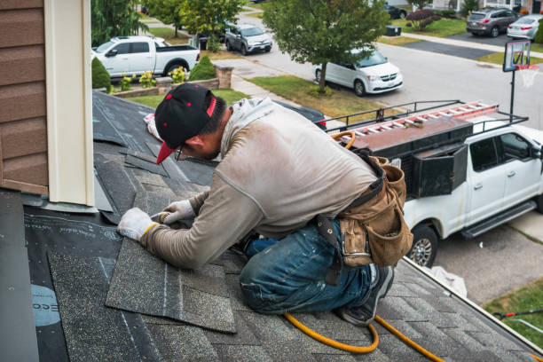 Professional Roof Inspection technician working in Merrill, OR